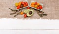 Organic food background. Studio photo of different fruits and vegetables on white wooden table. High resolution product. Royalty Free Stock Photo