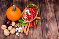 Organic food. Harvest of fresh vegetables.Autumn vegetables on a wooden table. Pumpkin season Royalty Free Stock Photo