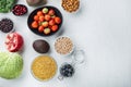 Organic food for healthy nutrition and superfoods, flat lay, on white background Royalty Free Stock Photo