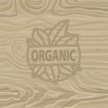 Organic Food Lettering on Wooden Background. Vector Royalty Free Stock Photo