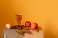 Organic fresh apple juice cider in a glass with apples maple autumn leaves and natural craft paper. Photo with free Royalty Free Stock Photo