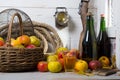 Organic fresh apples with bottle of Normandy cider