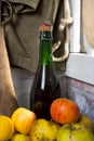 Organic fresh apples with bottle of Normandy cider