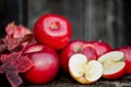 Organic fresh apples on wooden background in autum