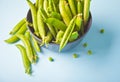 Organic fresh green peas and pea pods Royalty Free Stock Photo