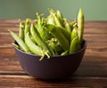 Organic fresh green peas and pea pods Royalty Free Stock Photo