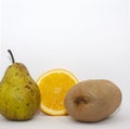 Organic fruits. Closeup apple, pear, kiwi, orange and banana on a white background with place for your text. Royalty Free Stock Photo