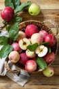 Organic fruits. Fall harvest background. Farmer\'s market. Basket of ripe apples on a rustic wooden table. View from above Royalty Free Stock Photo