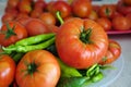 Organic garden products, large tomato, close-up large natural field tomato