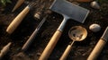 Organic gardening tools set on soil background. Royalty Free Stock Photo