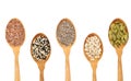 Organic grains seeds in wooden spoon,Chia seed, Sesame,Flax isolated on white background Royalty Free Stock Photo