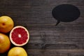 Organic grapefruits and speech bubble