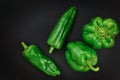 Organic Green bell pepper and Green paprika on black background Royalty Free Stock Photo