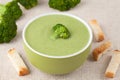 Organic green broccoli soup vegan recipe with