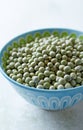 Organic green dried peas in a bowl