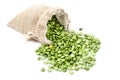 Organic green split peas filling in sack bag Royalty Free Stock Photo