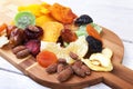 Organic Healthy Assorted Dried Fruit on bamboo wine board. Selective focus. Royalty Free Stock Photo