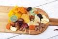 Organic Healthy Assorted Dried Fruit on wine board. Selective focus. Royalty Free Stock Photo