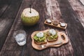 Organic healthy breakfast poached eggs on toast with avocado, young coconut Royalty Free Stock Photo