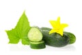 Organic healthy food. Fresh green cucumber natural vegetables with leaf and flower isolated on white background. Close up image