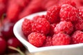 Organic and healthy raspberry in white bowl