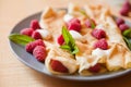 Organic home made Crepes with cream and raspberry