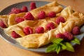 Organic home made Crepes with cream and raspberry Royalty Free Stock Photo