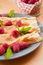 Organic home made Crepes with cream and raspberry Royalty Free Stock Photo