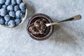 Organic Homemade Blueberry Huckleberry Jam Marmalade Preserves im Glass Bowl with Spoon Royalty Free Stock Photo