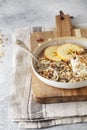 Organic homemade granola cereal with oats, nuts and dried berries. Muesli in a glass jar. Healthy vegan breakfast or snack. Copy Royalty Free Stock Photo