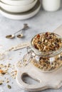 Organic homemade granola cereal with oats, nuts and dried berries. Muesli in a glass jar. Healthy vegan breakfast or snack. Copy Royalty Free Stock Photo