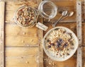 Organic homemade granola cereal with oats, nuts and dried berries. Muesli in a glass jar. Healthy vegan breakfast or snack. Copy Royalty Free Stock Photo