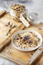 Organic homemade granola cereal with oats, nuts and dried berries. Muesli in a glass jar. Healthy vegan breakfast or snack. Copy Royalty Free Stock Photo