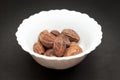 Organic Inknut in ceramic bowl Royalty Free Stock Photo