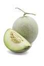 Organic japanese honeydew melon and a half on white isolated background with clipping path. Ripe green cantaloup melon have sweet Royalty Free Stock Photo