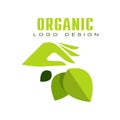 Organic logo design, healthy premium quality label with green leaves and human hands, emblem for cafe, packaging Royalty Free Stock Photo