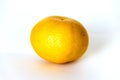 Organic mandarin orange. Isolated on white background. Close up.