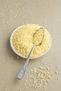 Organic Millet Gruel in a Spoon