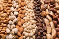 Organic mixed nuts as background, closeup. Royalty Free Stock Photo