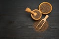 Organic natural chia seeds, bowl and wooden scoop close-up on wooden background or table Royalty Free Stock Photo