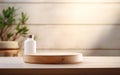 Organic natural eco concept. Empty wooden podium with plants on table over blurred bathroom background for product placement, Royalty Free Stock Photo