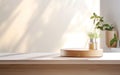 Organic natural eco concept. Empty wooden podium with plants on table over blurred bathroom background for product placement, Royalty Free Stock Photo