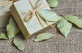 Organic natural handmade bay laurel soap with olive oil and leaves on burlap sack Royalty Free Stock Photo