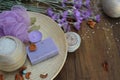 Organic natural soap, spa handmade artisan cosmetics, candle on golden plate