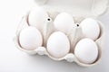 Organic packaging of white chicken eggs isolated on white background