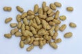 organic peanuts in shell, isolated on white background. Royalty Free Stock Photo