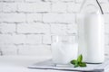 Organic probiotic milk kefir drink or yogurt in glass containers,on the white grey background. Gut health. Probiotic cold fermen
