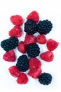 Organic rasberries and blackberries over head macro still life image