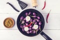 Organic Raw Baby Indian Eggplants in a Pan Top View Flat Lay Raw Eggplants Wooden Background Royalty Free Stock Photo