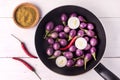 Organic Raw Baby Indian Eggplants in a Pan Top View Flat Lay Raw Eggplants Wooden Background Royalty Free Stock Photo